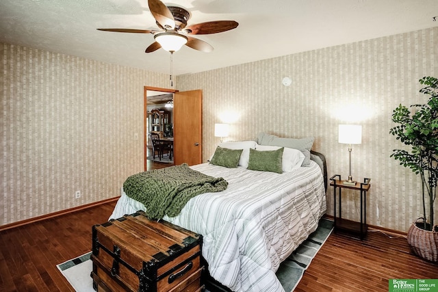 9706 N 51st St, Omaha, NE 68152 - bedroom with wallpapered walls, wood-type flooring, baseboards, and a ceiling fan
