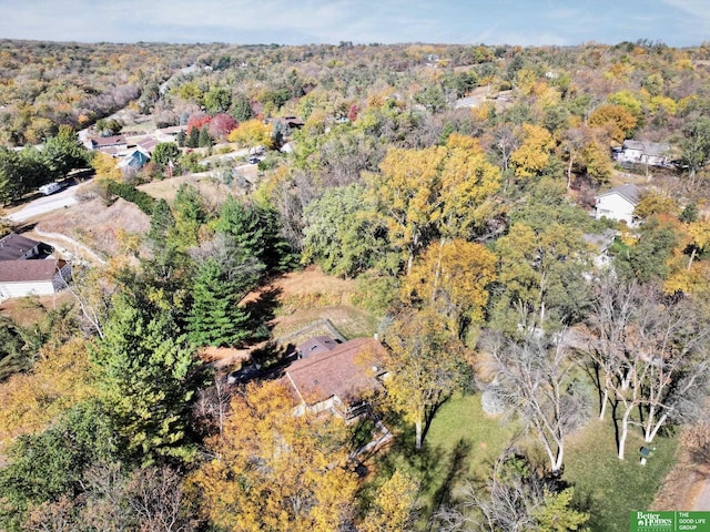 9706 N 51st St, Omaha, NE 68152 - aerial view of property and surrounding area with a heavily wooded area