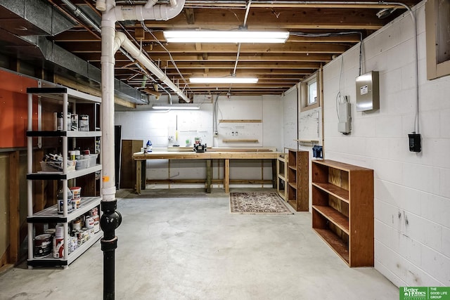 9706 N 51st St, Omaha, NE 68152 - basement featuring a workshop area and concrete block wall