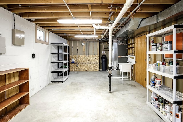 9706 N 51st St, Omaha, NE 68152 - unfinished below grade area with a water softener system and a sink