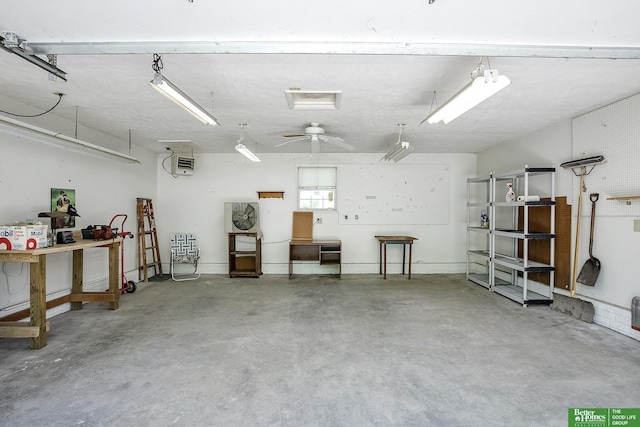 9706 N 51st St, Omaha, NE 68152 - garage with a workshop area and a ceiling fan