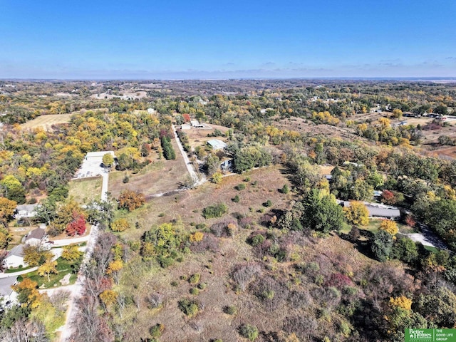 9706 N 51st St, Omaha, NE 68152 - aerial view of property and surrounding area with a heavily wooded area
