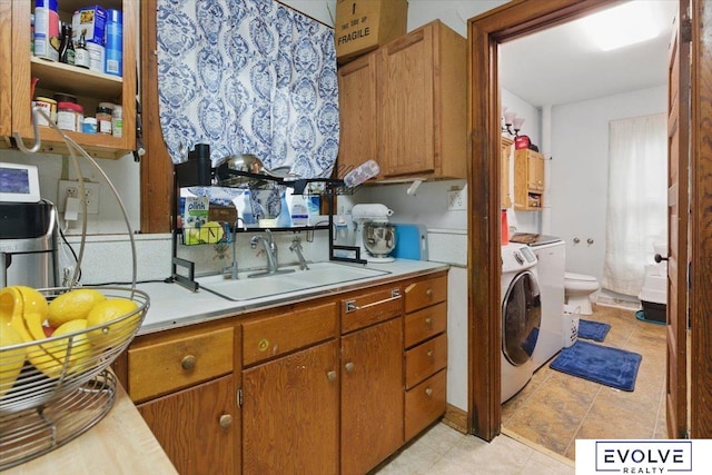 453 W 4th St, Wahoo, NE 68066 - washroom with washer and dryer and cabinet space