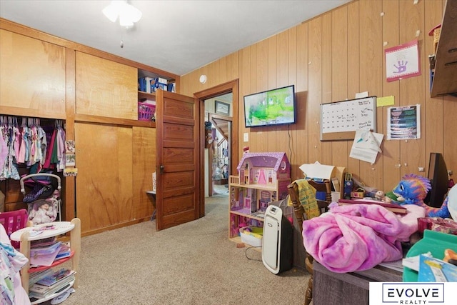 453 W 4th St, Wahoo, NE 68066 - game room featuring carpet floors and wood walls