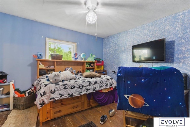 453 W 4th St, Wahoo, NE 68066 - bedroom featuring wallpapered walls, hardwood / wood-style floors, and a ceiling fan