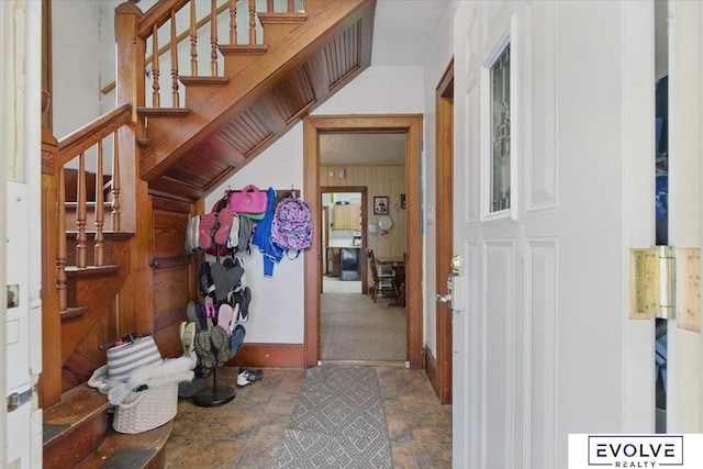 453 W 4th St, Wahoo, NE 68066 - entrance foyer featuring stairway and stone finish floors