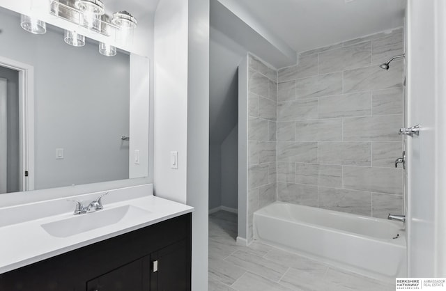 2909 N 26th St, Omaha, NE 68111 - bathroom featuring washtub / shower combination, vanity, and baseboards