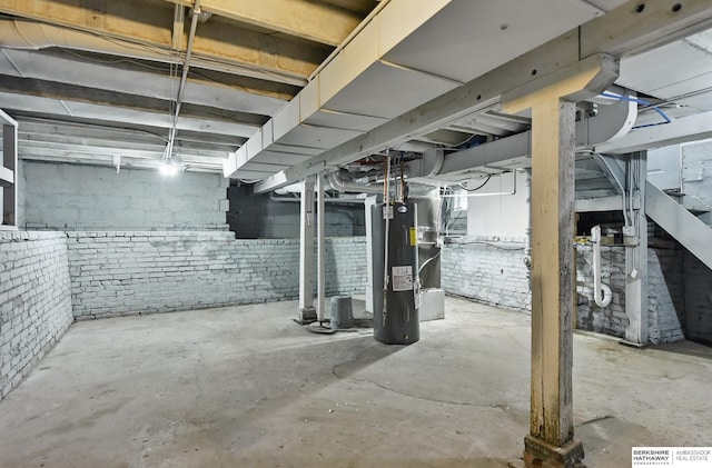 2909 N 26th St, Omaha, NE 68111 - unfinished basement featuring water heater