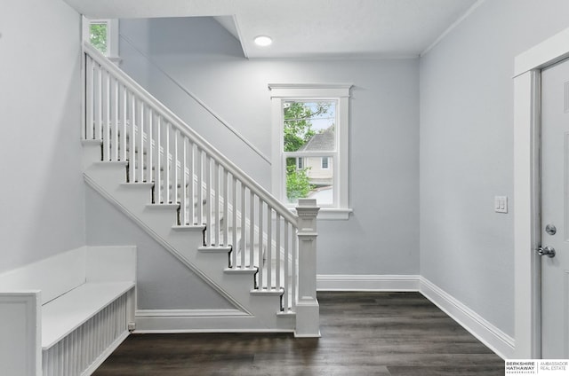 2909 N 26th St, Omaha, NE 68111 - stairs featuring baseboards, wood finished floors, and recessed lighting