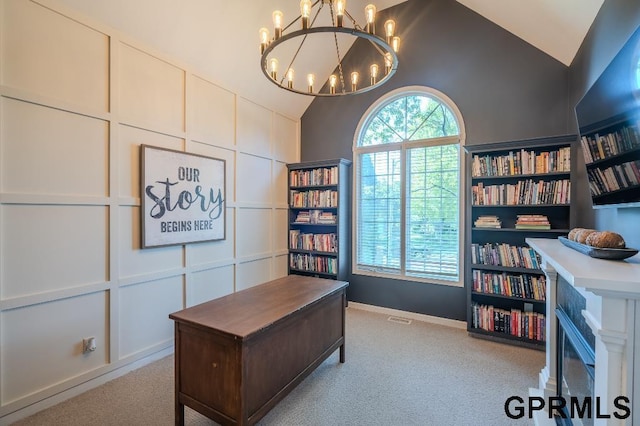 15931 Yates St, Omaha, NE 68116 - carpeted home office featuring vaulted ceiling and a chandelier