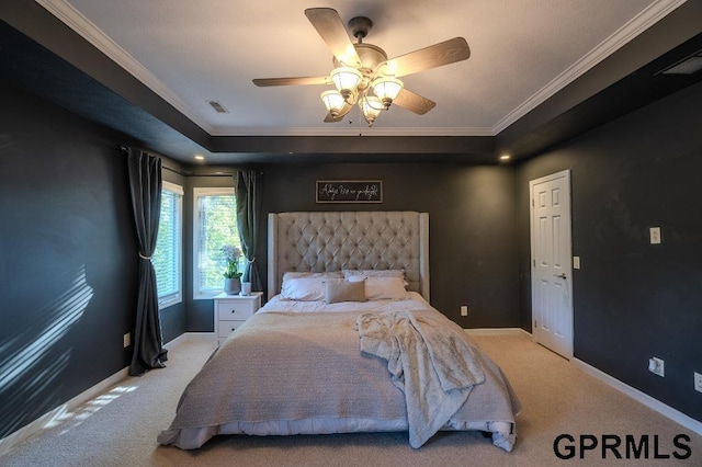 15931 Yates St, Omaha, NE 68116 - carpeted bedroom featuring crown molding, baseboards, a tray ceiling, and ceiling fan