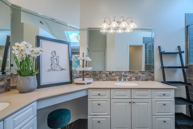 15931 Yates St, Omaha, NE 68116 - bathroom featuring vanity, backsplash, and a skylight