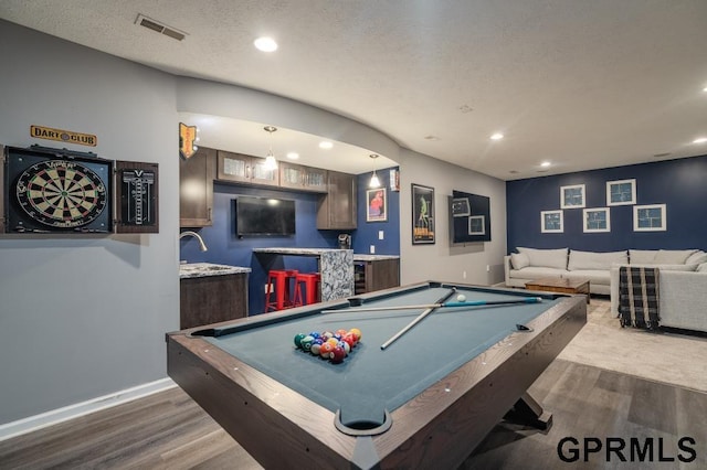 15931 Yates St, Omaha, NE 68116 - playroom with dark wood-style floors, bar with sink, recessed lighting, billiards, and baseboards
