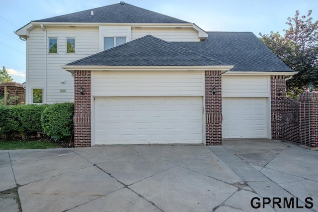 15931 Yates St, Omaha, NE 68116 - garage featuring driveway