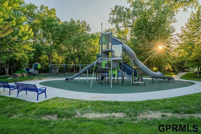 15931 Yates St, Omaha, NE 68116 - community jungle gym with a lawn and view of wooded area