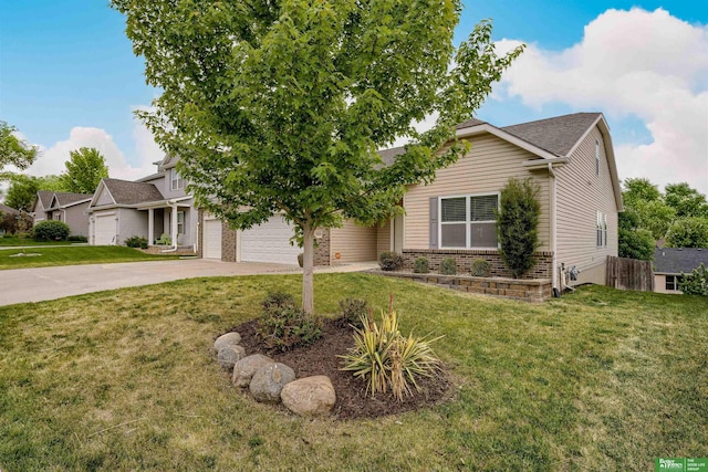 4604 Hansen Ave, Papillion, NE 68133 - view of property hidden behind natural elements with brick siding, concrete driveway, and a front lawn