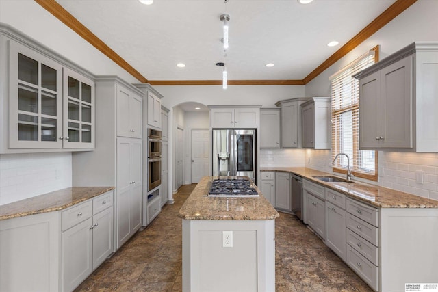 14906 Hanover St, Bennington, NE 68007 - kitchen with appliances with stainless steel finishes, gray cabinetry, a sink, a center island, and arched walkways