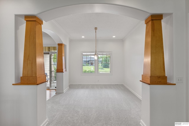 14906 Hanover St, Bennington, NE 68007 - unfurnished room featuring ornamental molding, light colored carpet, arched walkways, baseboards, and recessed lighting