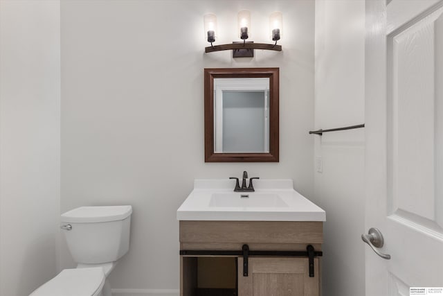 14906 Hanover St, Bennington, NE 68007 - half bath with toilet, vanity, and baseboards