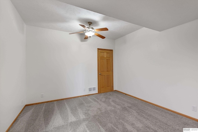 14906 Hanover St, Bennington, NE 68007 - carpeted spare room featuring ceiling fan and baseboards