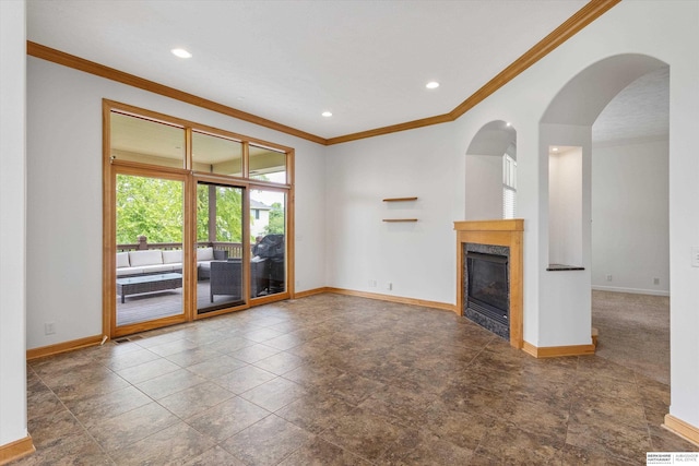 14906 Hanover St, Bennington, NE 68007 - unfurnished living room with baseboards, ornamental molding, a glass covered fireplace, recessed lighting, and arched walkways