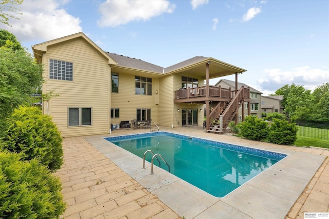 14906 Hanover St, Bennington, NE 68007 - view of pool featuring stairs, a patio area, and a deck