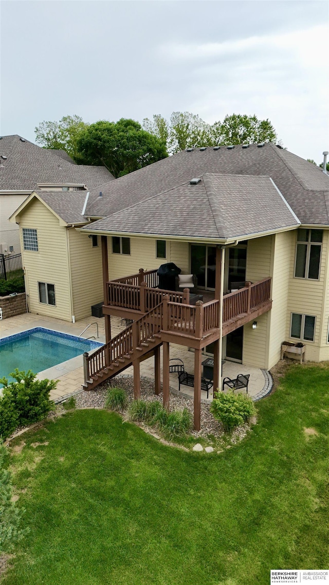 14906 Hanover St, Bennington, NE 68007 - rear view of property with a deck, stairway, a lawn, and roof with shingles