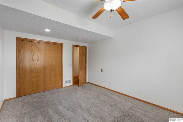 14906 Hanover St, Bennington, NE 68007 - unfurnished bedroom with light carpet, baseboards, a closet, and a ceiling fan