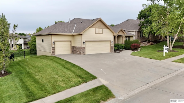 14906 Hanover St, Bennington, NE 68007 - craftsman-style home with driveway, an attached garage, a shingled roof, and stone siding