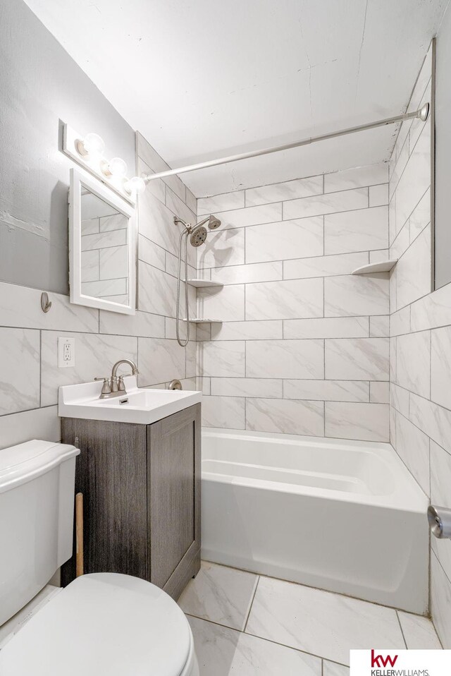 4714 Parker St, Omaha, NE 68104 - full bath with toilet, vanity, bathtub / shower combination, and marble finish floors