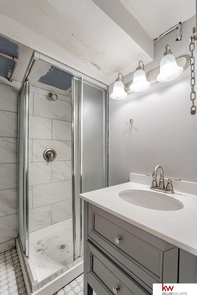 4714 Parker St, Omaha, NE 68104 - full bath featuring a shower stall, vanity, and tile patterned floors