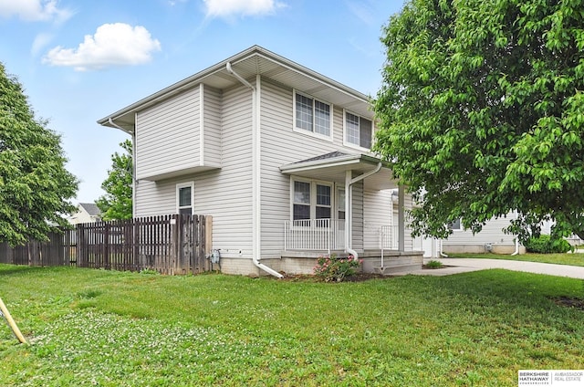 1502 Florence Blvd, Omaha, NE 68110 - view of side of home featuring a porch