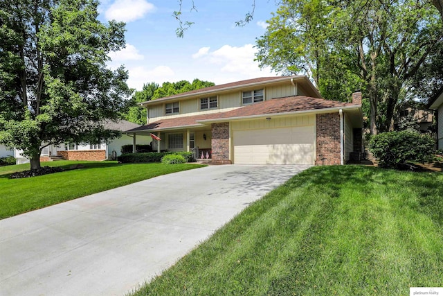 2106 S 145th Ave, Omaha, NE 68144 - traditional-style home featuring a chimney, an attached garage, a front lawn, and brick siding