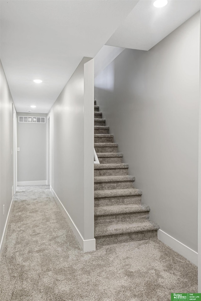 2273 N 38th Ave, Omaha, NE 68111 - stairway with carpet floors, baseboards, and recessed lighting