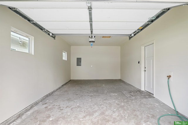 2273 N 38th Ave, Omaha, NE 68111 - garage featuring electric panel and a garage door opener