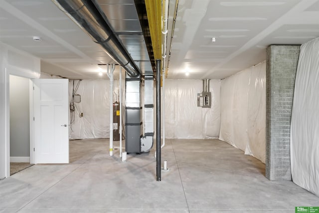 2273 N 38th Ave, Omaha, NE 68111 - unfinished basement with electric panel, heating unit, and electric water heater
