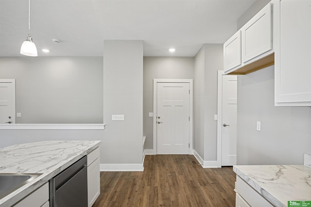 2273 N 38th Ave, Omaha, NE 68111 - kitchen featuring stainless steel dishwasher, dark wood finished floors, light countertops, white cabinets, and recessed lighting