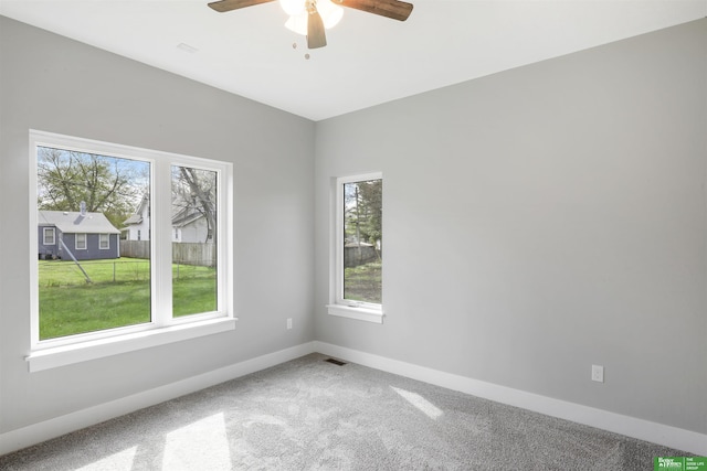 2273 N 38th Ave, Omaha, NE 68111 - carpeted empty room with ceiling fan and baseboards