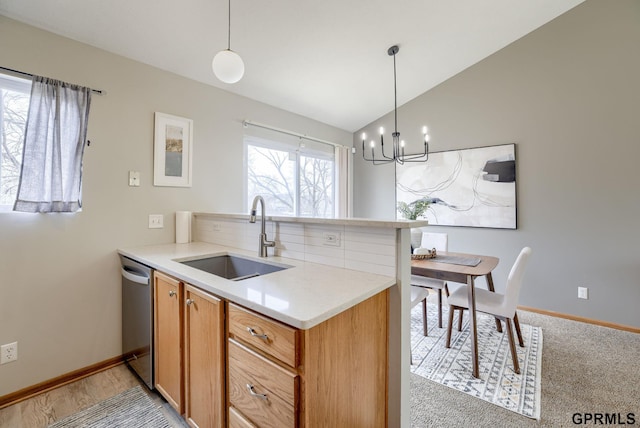 15614 Redwood St, Omaha, NE 68136 - kitchen with a sink, dishwasher, plenty of natural light, a chandelier, and lofted ceiling