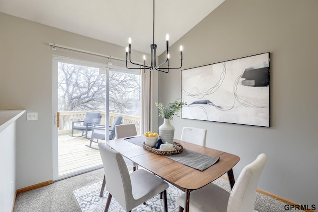 15614 Redwood St, Omaha, NE 68136 - dining room with a chandelier, baseboards, light colored carpet, and lofted ceiling