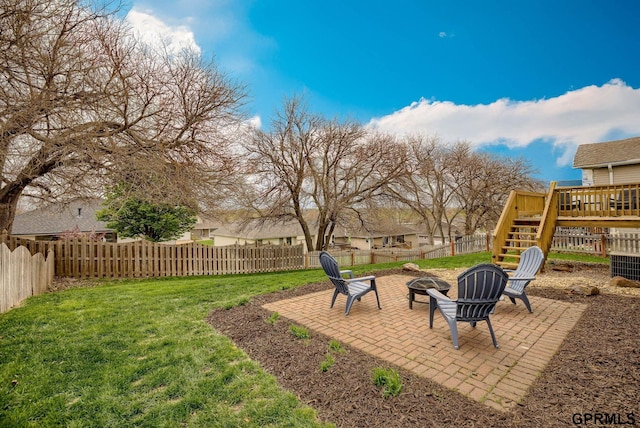 15614 Redwood St, Omaha, NE 68136 - view of yard featuring an outdoor fire pit, a wooden deck, a patio area, and stairs
