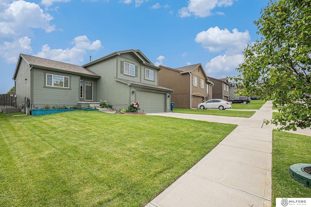 7423 N 139th Ave, Omaha, NE 68142 - view of front of house featuring concrete driveway, a garage, and a front lawn