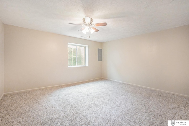 7423 N 139th Ave, Omaha, NE 68142 - carpeted empty room featuring ceiling fan, electric panel, and baseboards