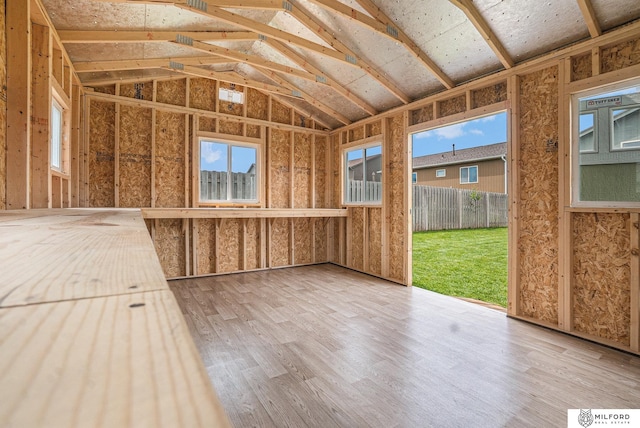 7423 N 139th Ave, Omaha, NE 68142 - unfurnished sunroom featuring vaulted ceiling and healthy amount of natural light