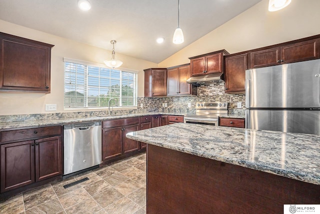 7423 N 139th Ave, Omaha, NE 68142 - kitchen with appliances with stainless steel finishes, a sink, under cabinet range hood, lofted ceiling, and backsplash