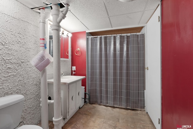 3920 Randolph St, Lincoln, NE 68510 - full bathroom featuring vanity, toilet, and a shower with curtain