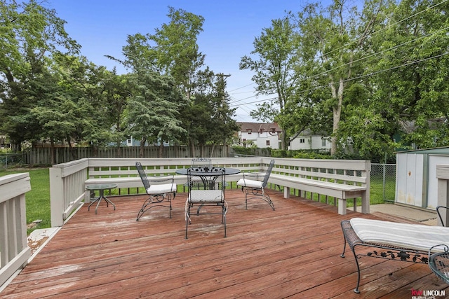 3920 Randolph St, Lincoln, NE 68510 - wooden deck featuring outdoor dining space