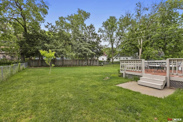 3920 Randolph St, Lincoln, NE 68510 - view of yard with a deck
