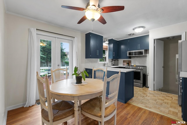 3920 Randolph St, Lincoln, NE 68510 - dining space with a ceiling fan, ornamental molding, french doors, and parquet flooring