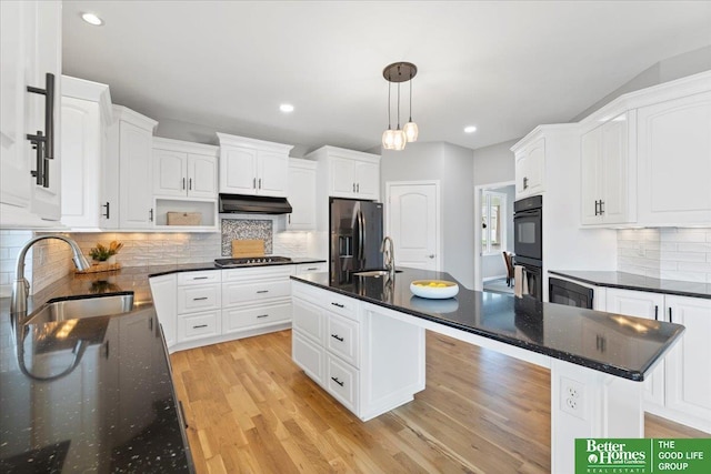 16831 Chandler St, Omaha, NE 68136 - kitchen with stainless steel fridge with ice dispenser, stovetop, under cabinet range hood, a sink, and recessed lighting